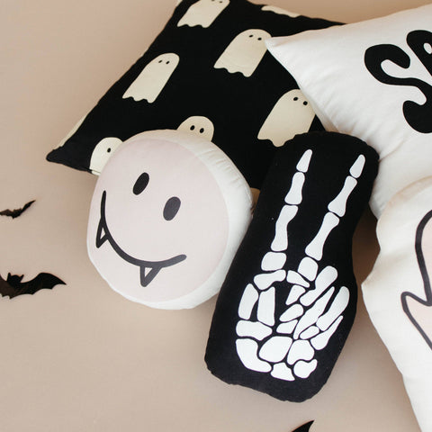 Skeleton peace sign pillow